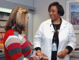 a doctor communicating health information to a patient