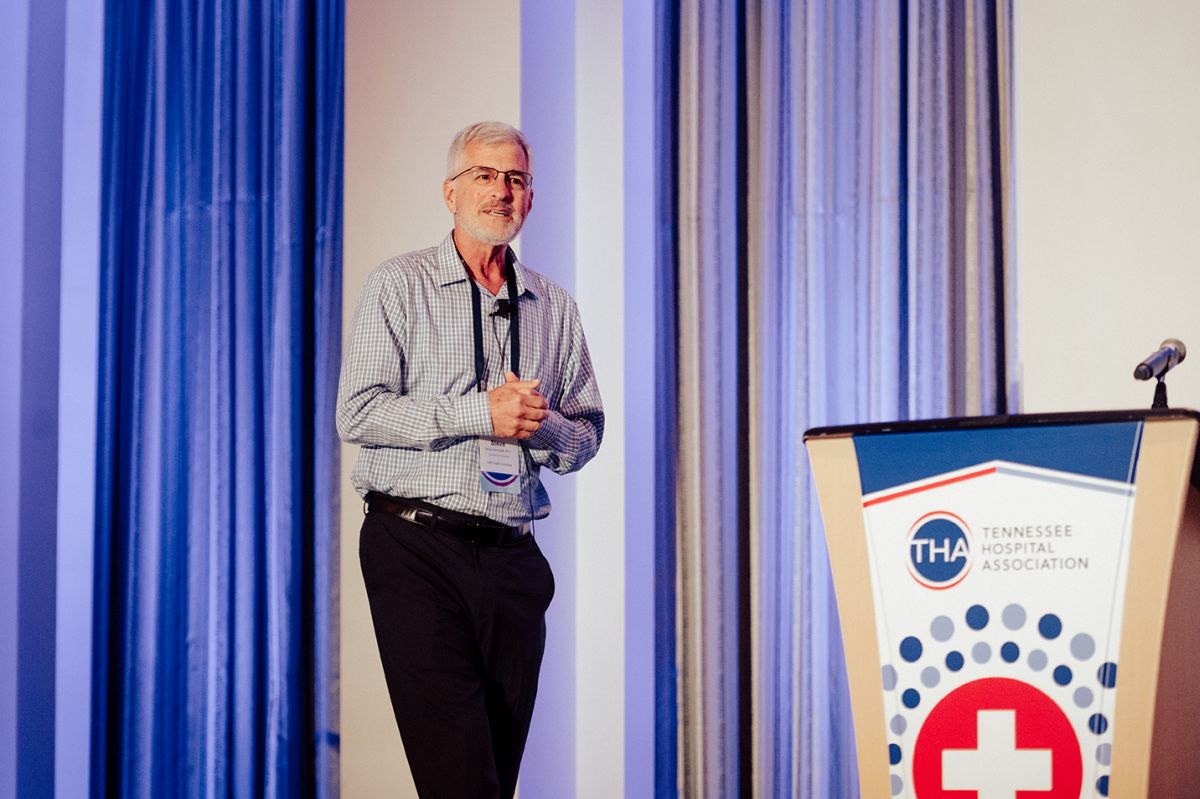 healthcare management consultant Dr. Steve Berkowitz speaking at an event